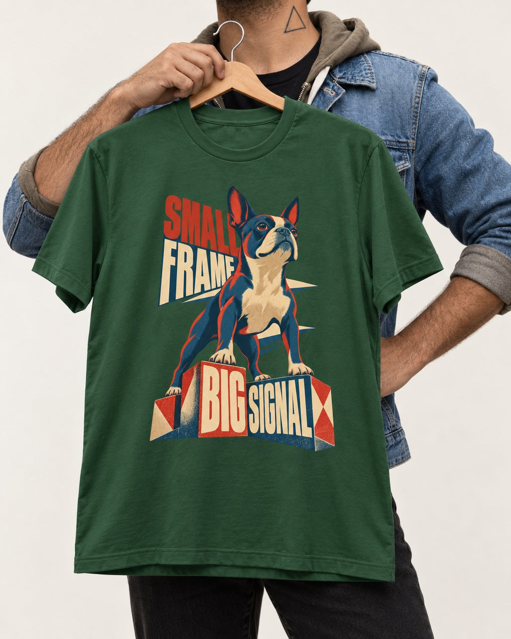 Small Frame Big Signal Boston Terrier T-Shirt in Forest Green, held up on a hanger