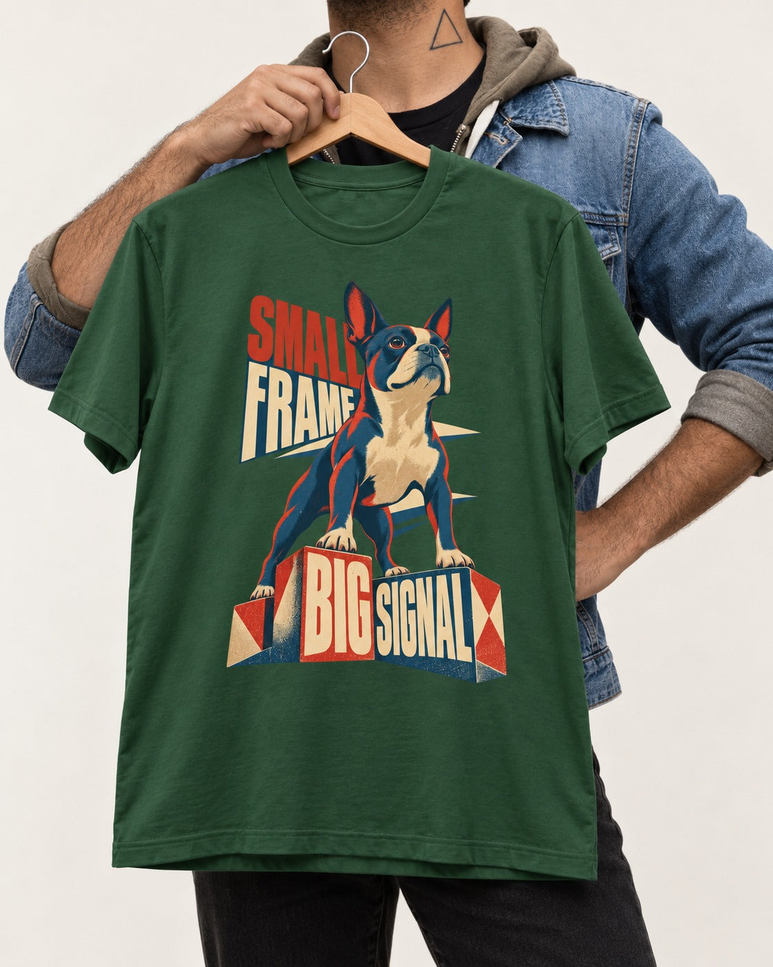 Small Frame Big Signal Boston Terrier T-Shirt in Forest Green, held up on a hanger