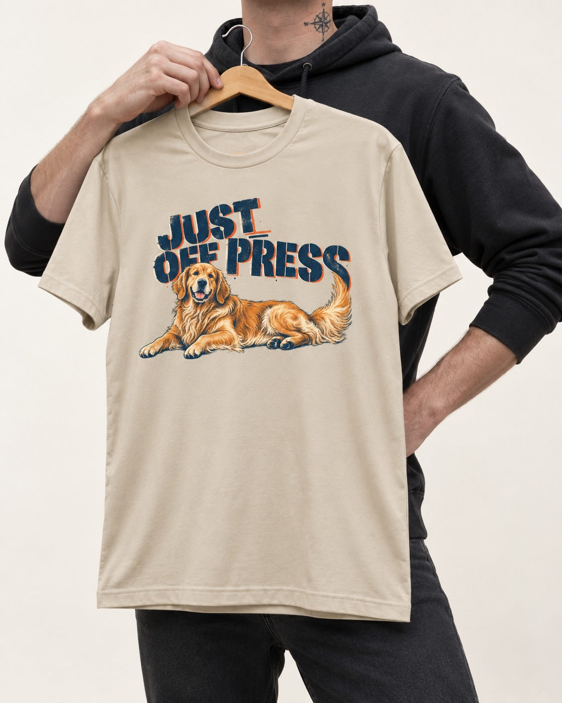 Golden Retriever Just Off Press T-Shirt in Sand, held up on a hanger