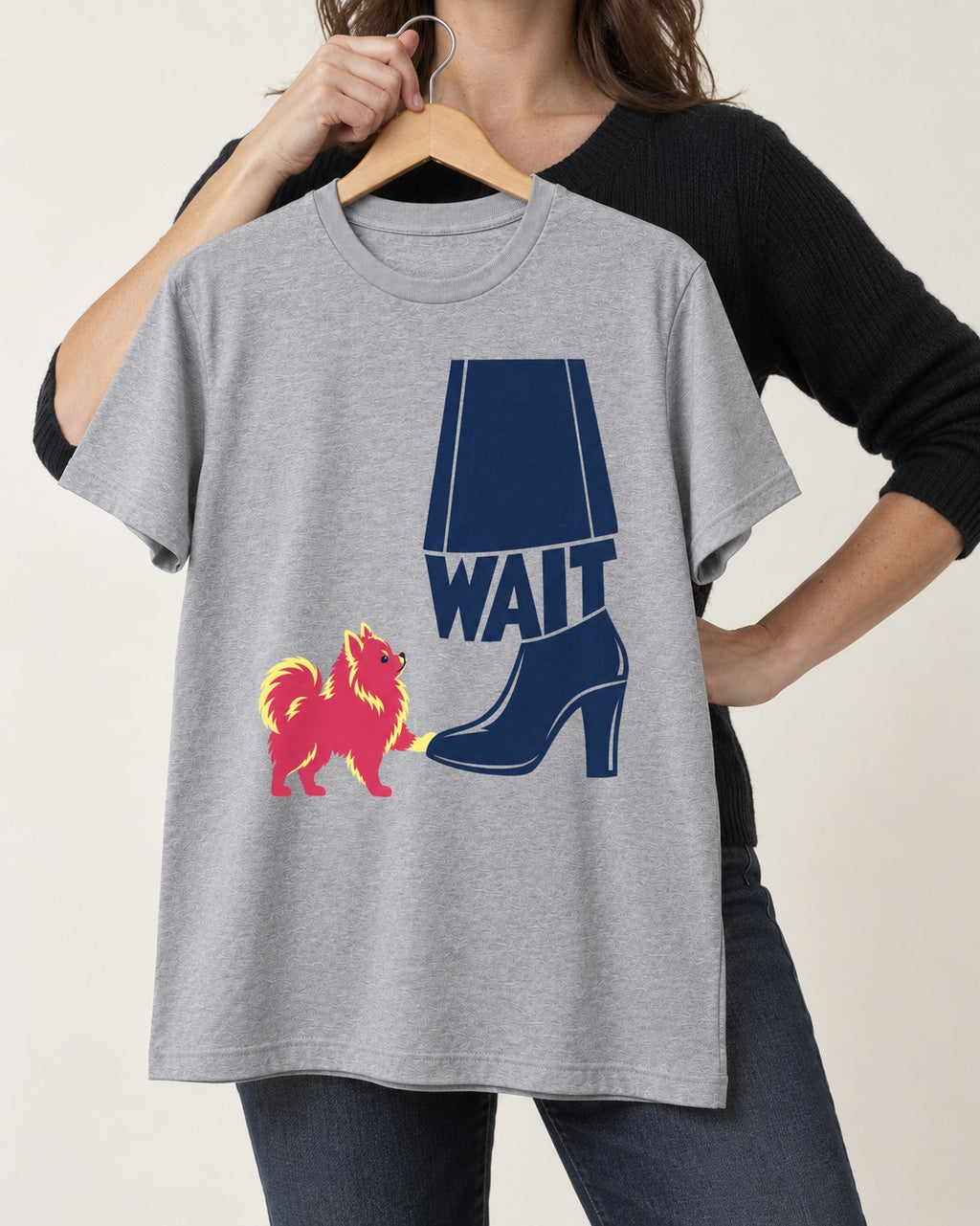 Pomeranian Says Wait T-Shirt in Sport Grey, held up on a hanger