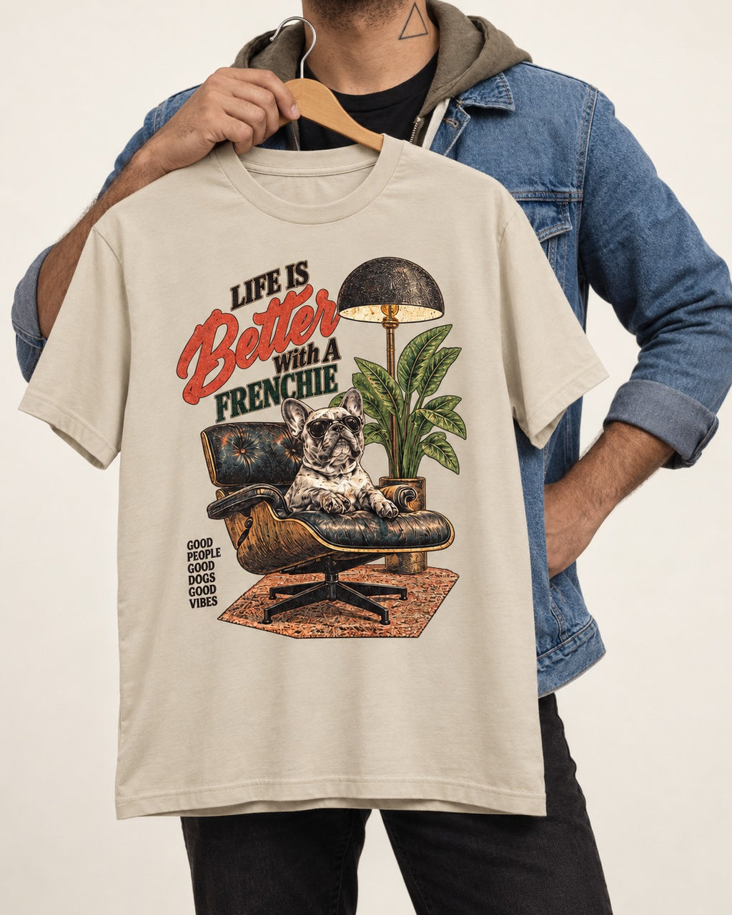 Better with a Frenchie T-Shirt in Sand, held up on a hanger