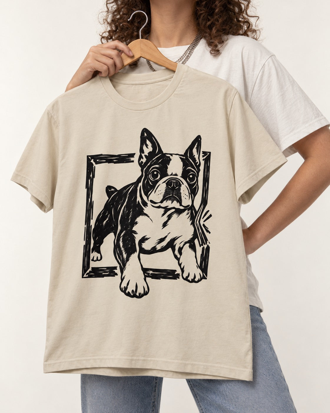 Boston Terrier Unstoppable T-Shirt in Sand, held up on a hanger