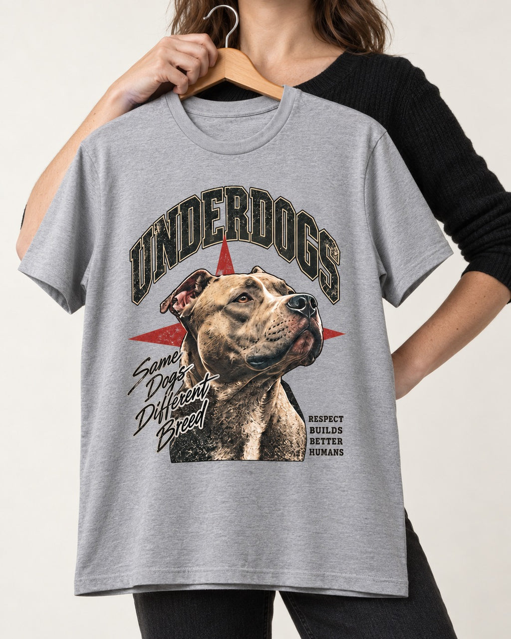 Pitbull Underdogs Same Dogs Different Breed Portrait Graphic T-Shirt in Sport Grey, held up on a hanger