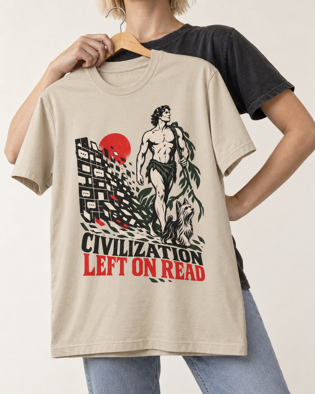 Yorkshire Terrier Left Civilization on Read T-Shirt in Sand, held up on a hanger