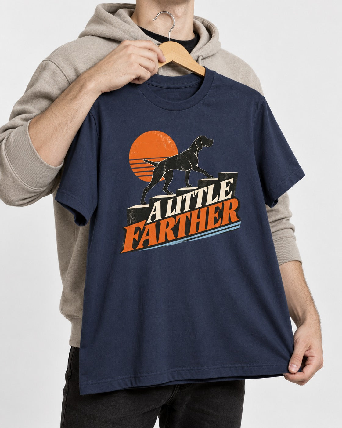 German Shorthaired Pointer A Little Farther Sunset Steps Graphic T-Shirt in Navy, held up on a hanger