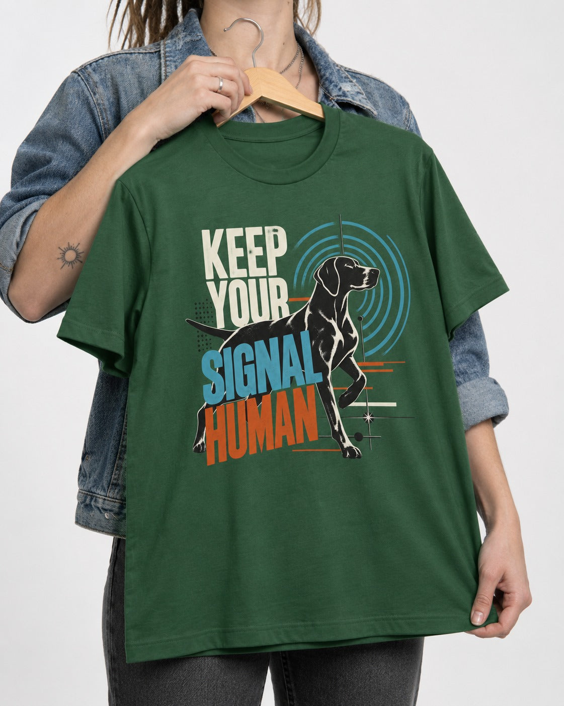 German Shorthaired Pointer Keep Your Signal Human Broadcast Graphic T-Shirt in Forest Green, held up on a hanger