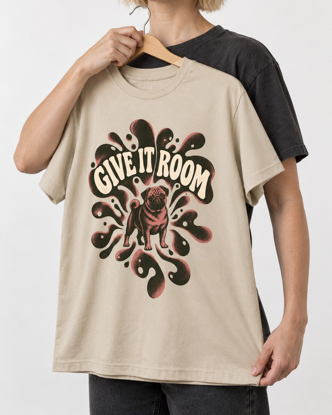 Give Pug Room T-Shirt in Sand, held up on a hanger