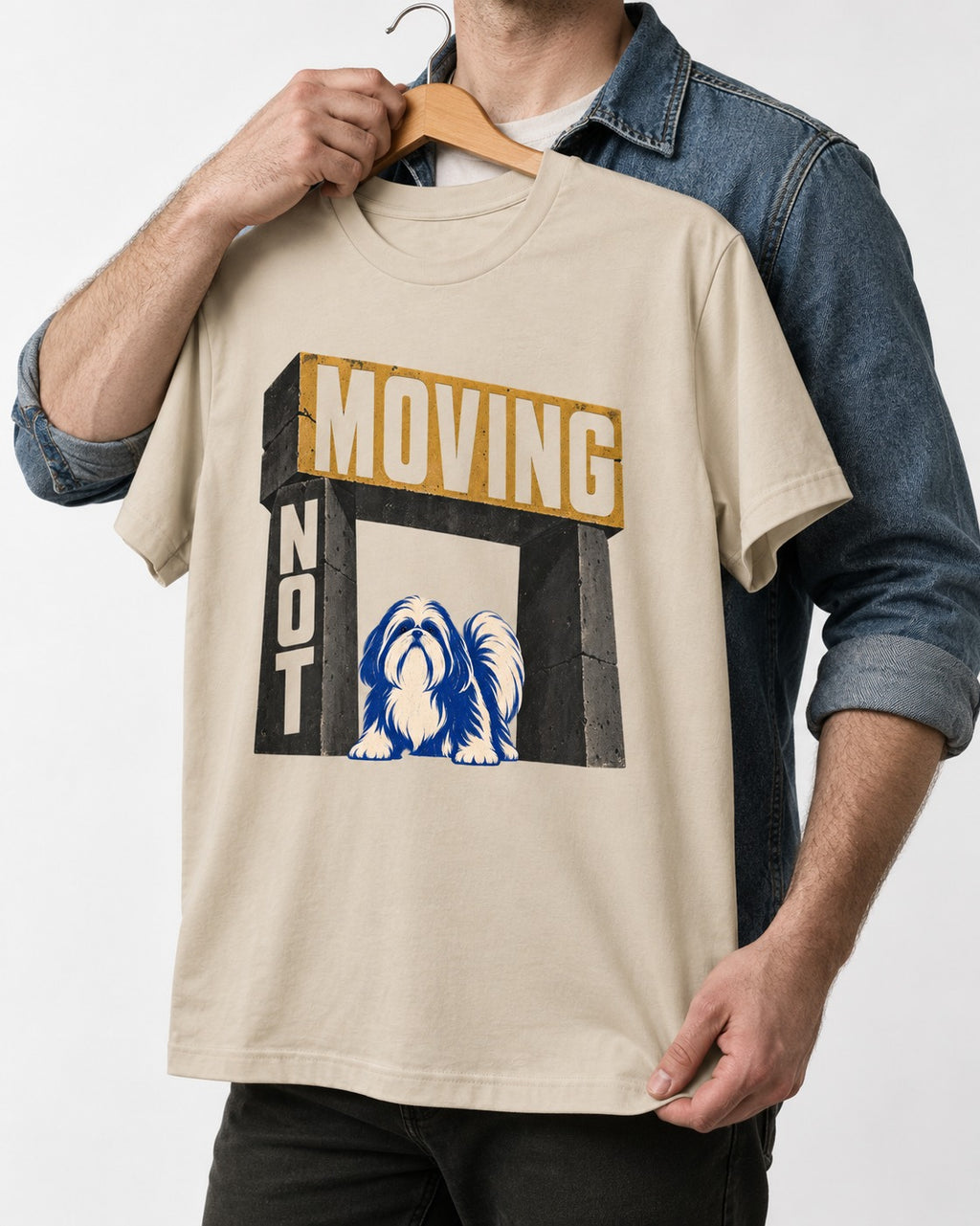 Not Moving Shih Tzu T-Shirt in Sand, held up on a hanger