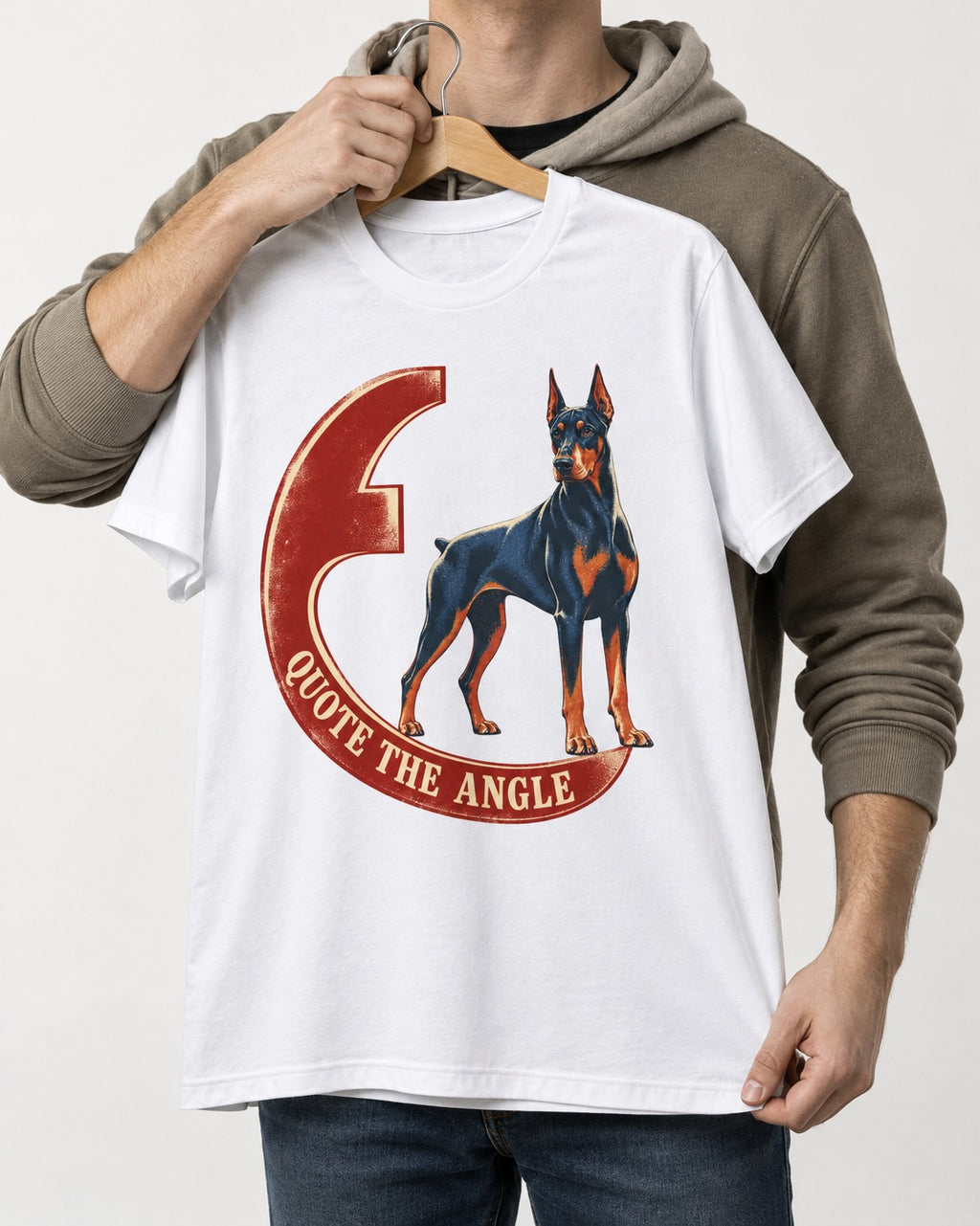 Doberman Quote the Angle Crescent Graphic T-Shirt in White, held up on a hanger