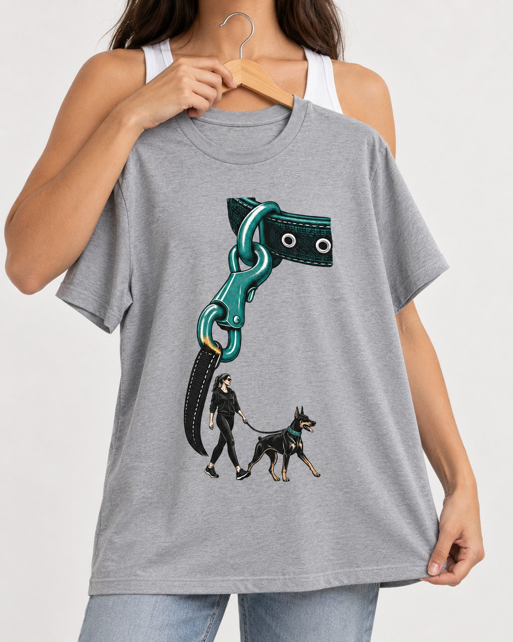 Doberman Oversized Leash Hardware Walk Graphic T-Shirt in Sport Grey, held up on a hanger