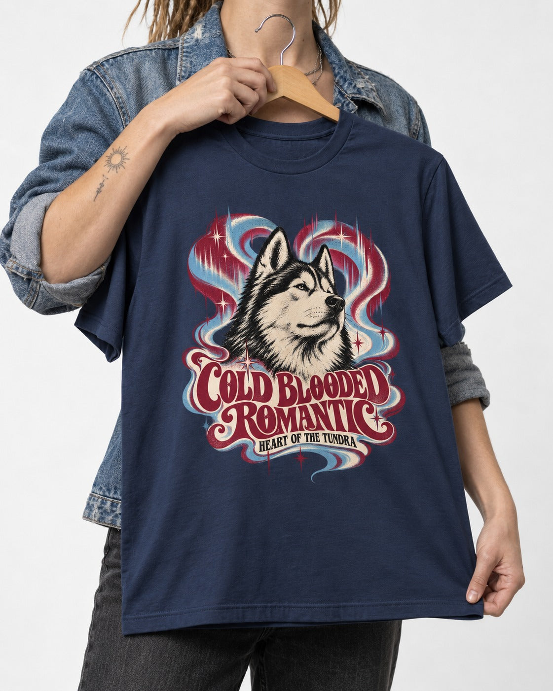 Husky Cold Blooded Romantic Heart of the Tundra Graphic T-Shirt in Navy, held up on a hanger
