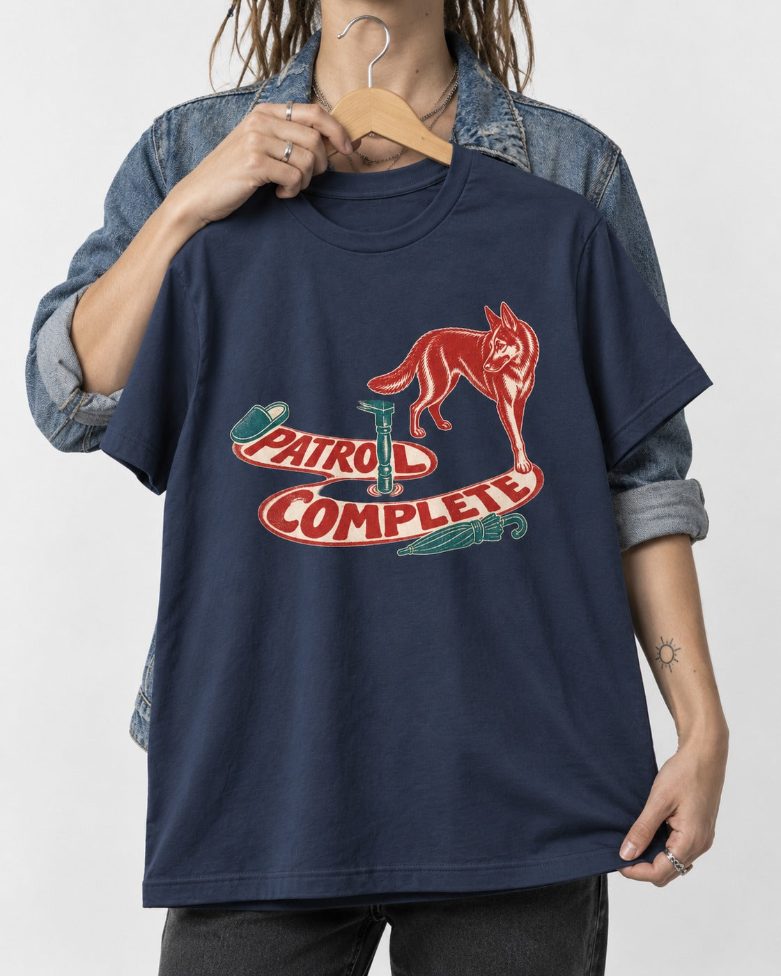 German Shepherd Dog Patrol Complete Umbrella Graphic T-Shirt in Navy, held up on a hanger