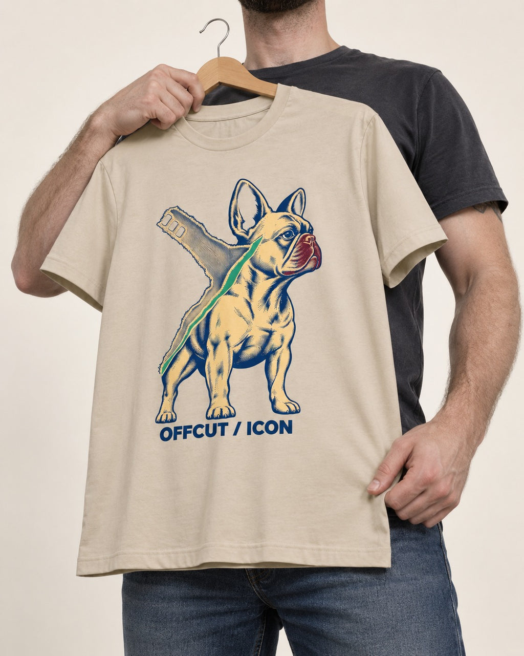 Offcut Frenchie Icon T-Shirt in Sand, held up on a hanger