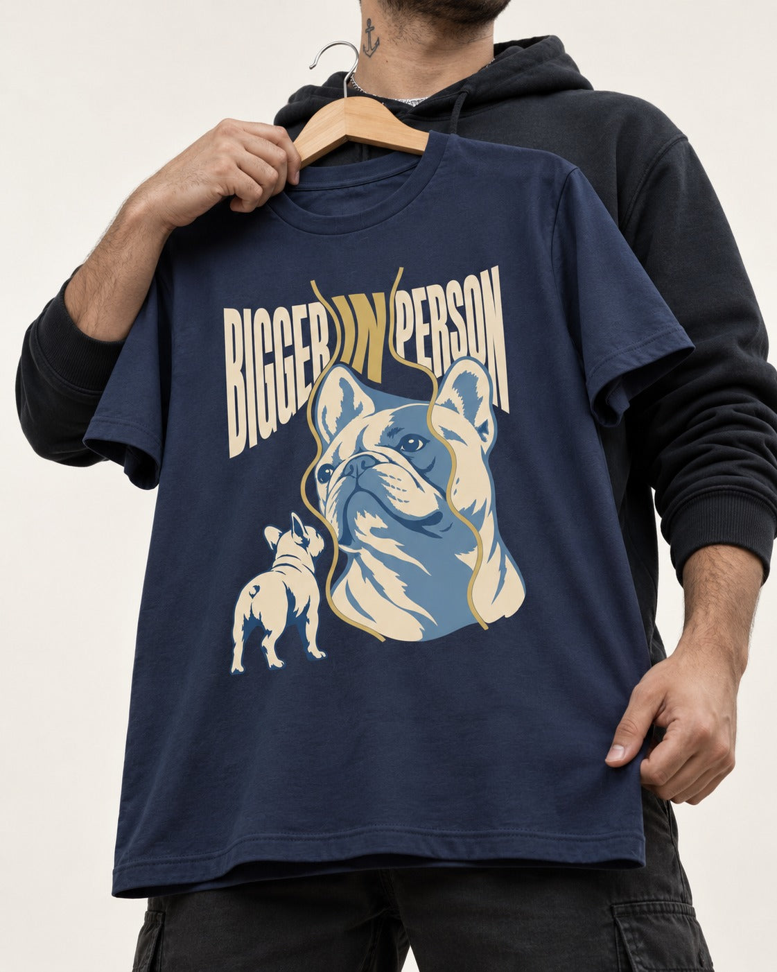 Frenchie Bigger in Person Mirror Graphic T-Shirt in Navy, held up on a hanger