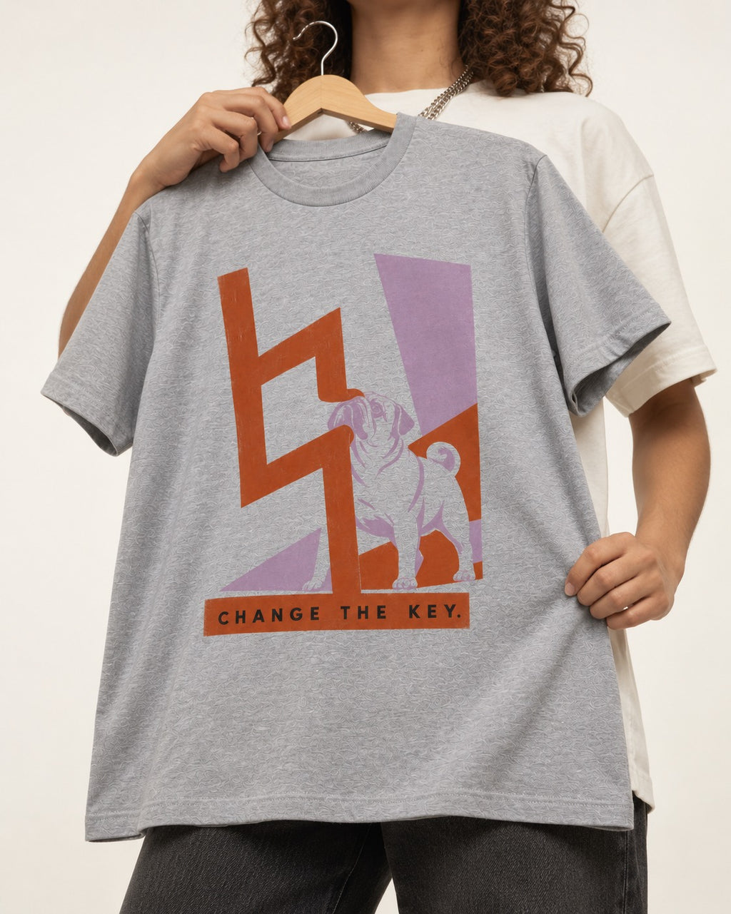 Pug Change the Key T-Shirt in Sport Grey, held up on a hanger