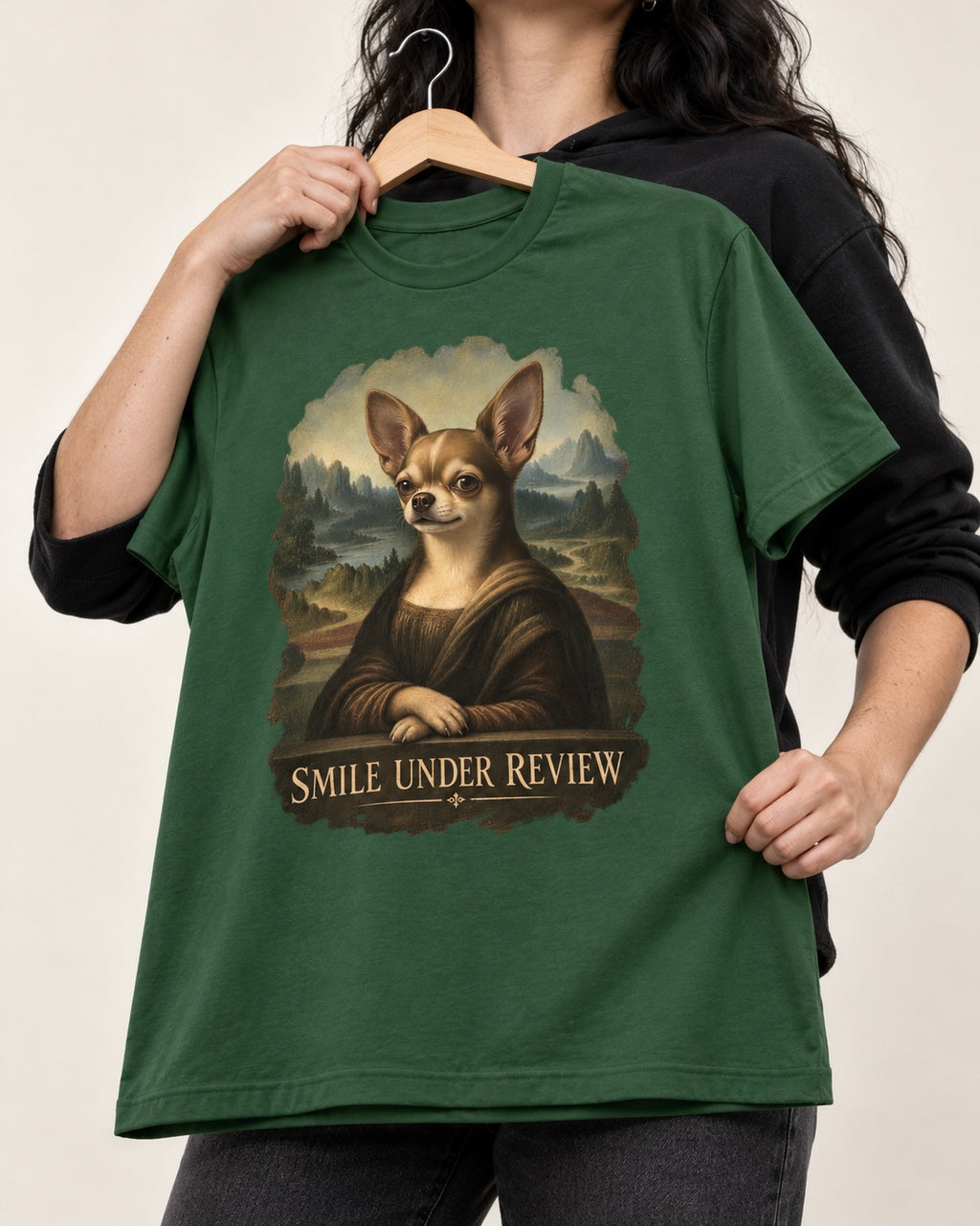 Chihuahua Smile Under Review Mona Lisa Portrait T-Shirt in Forest Green, held up on a hanger