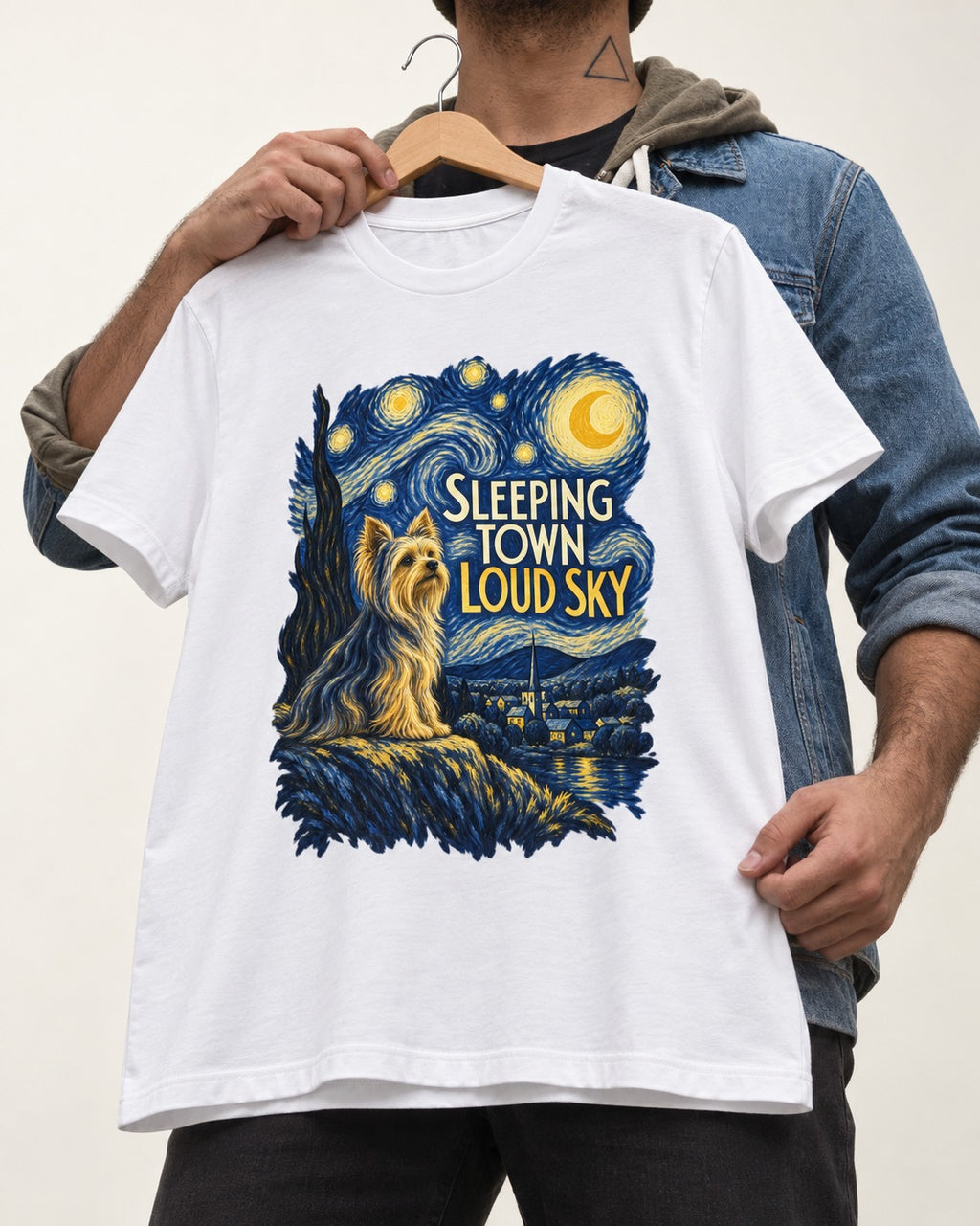 Yorkshire Terrier Sleeping Town Loud Sky Starry Night Graphic T-Shirt in White, held up on a hanger