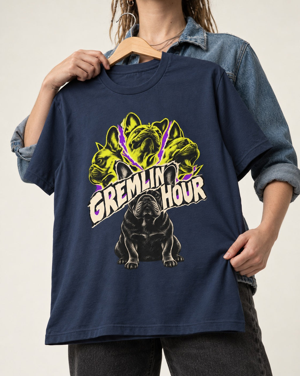 Frenchie Gremlin Hour Multi Portrait Graphic T-Shirt in Navy, held up on a hanger