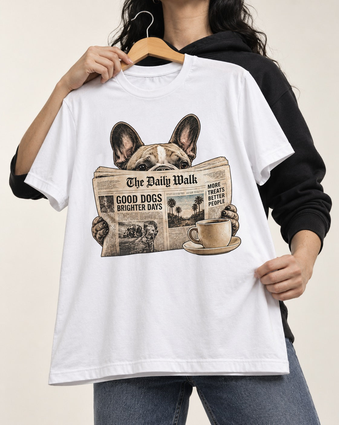 Frenchie Good Dogs Brighter Days Newspaper Graphic T-Shirt in White, held up on a hanger