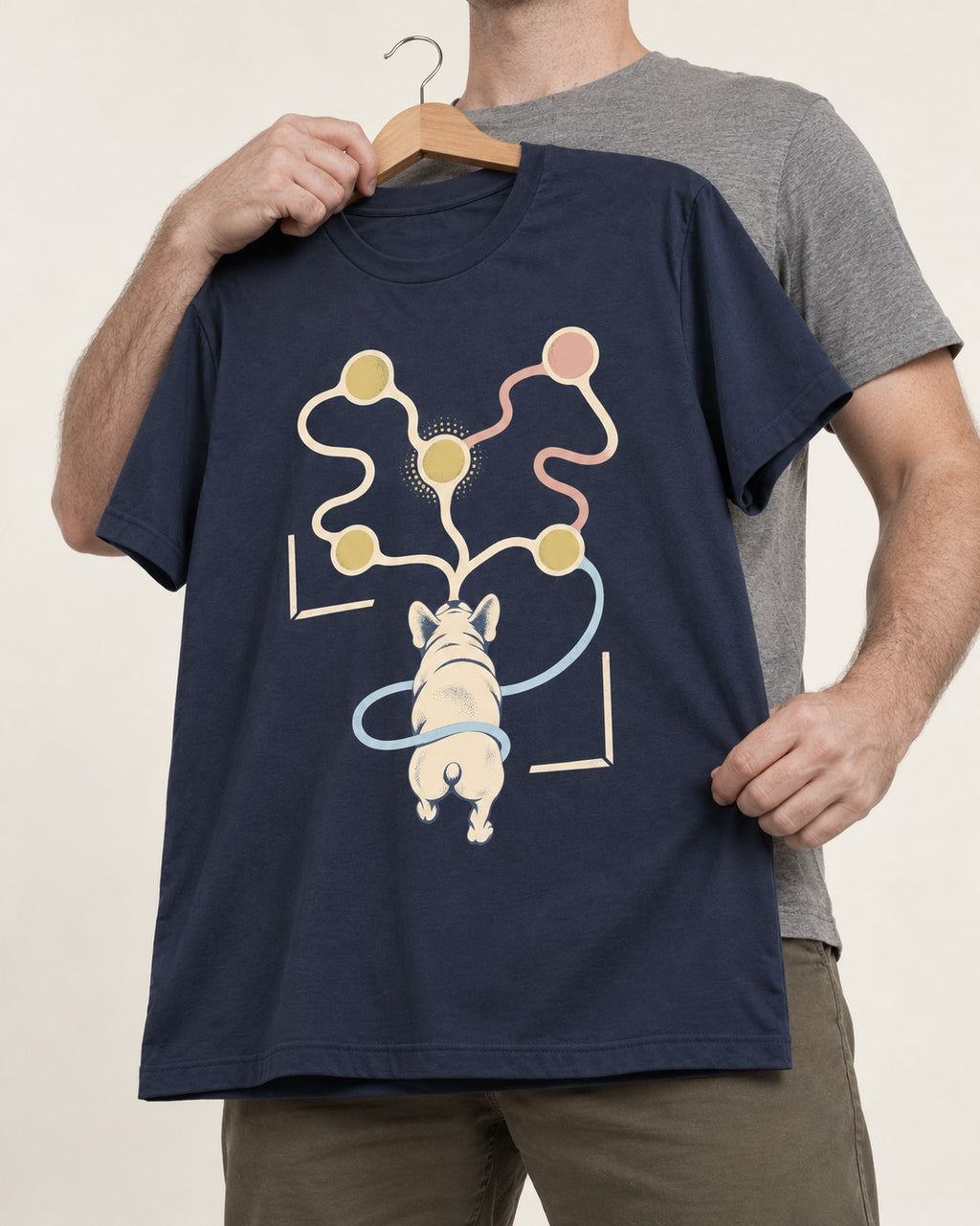 Frenchie Scent Circuit Rear View Graphic T-Shirt in Navy, held up on a hanger