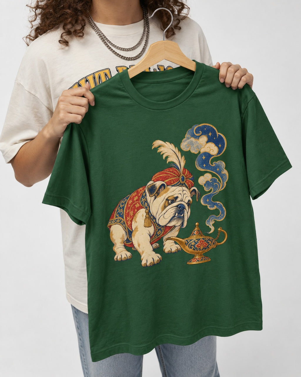 English Bulldog Magic Lamp Genie Graphic T-Shirt in Forest Green, held up on a hanger