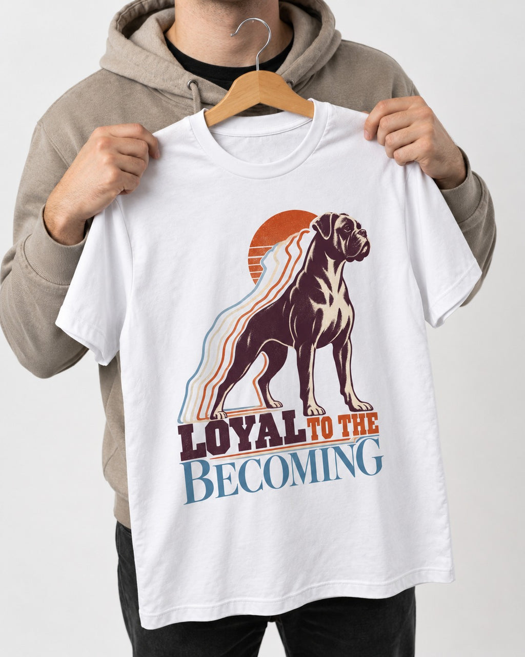Boxer Loyal to the Becoming T-Shirt in White, held up on a hanger