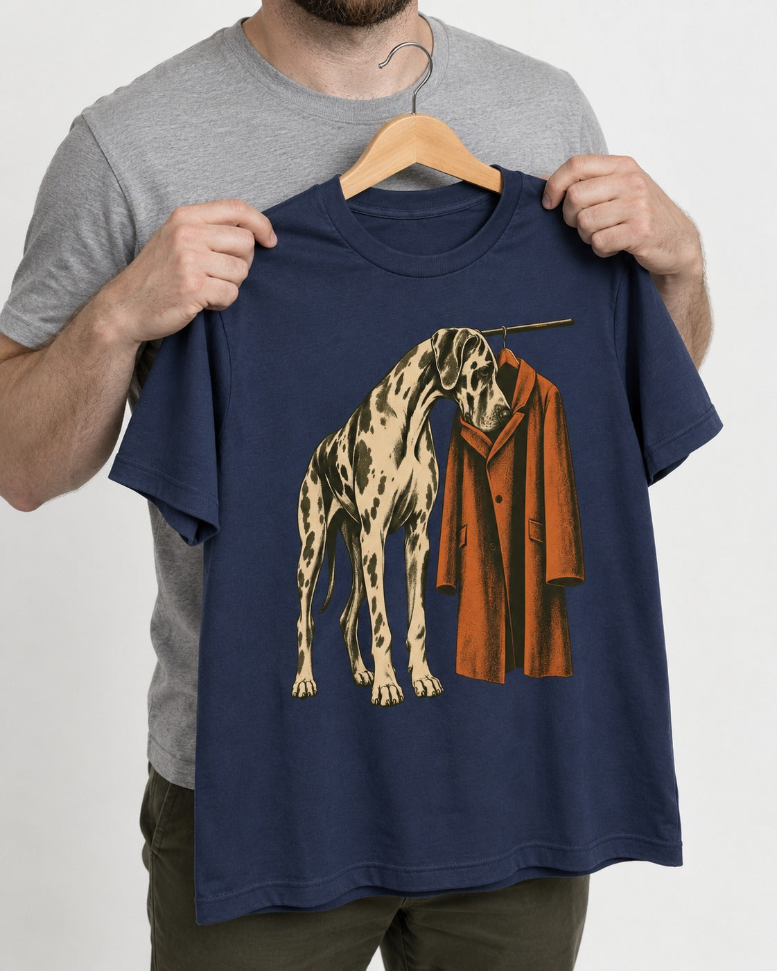Great Dane Harlequin Coat Rack Overcoat Graphic T-Shirt in Navy, held up on a hanger