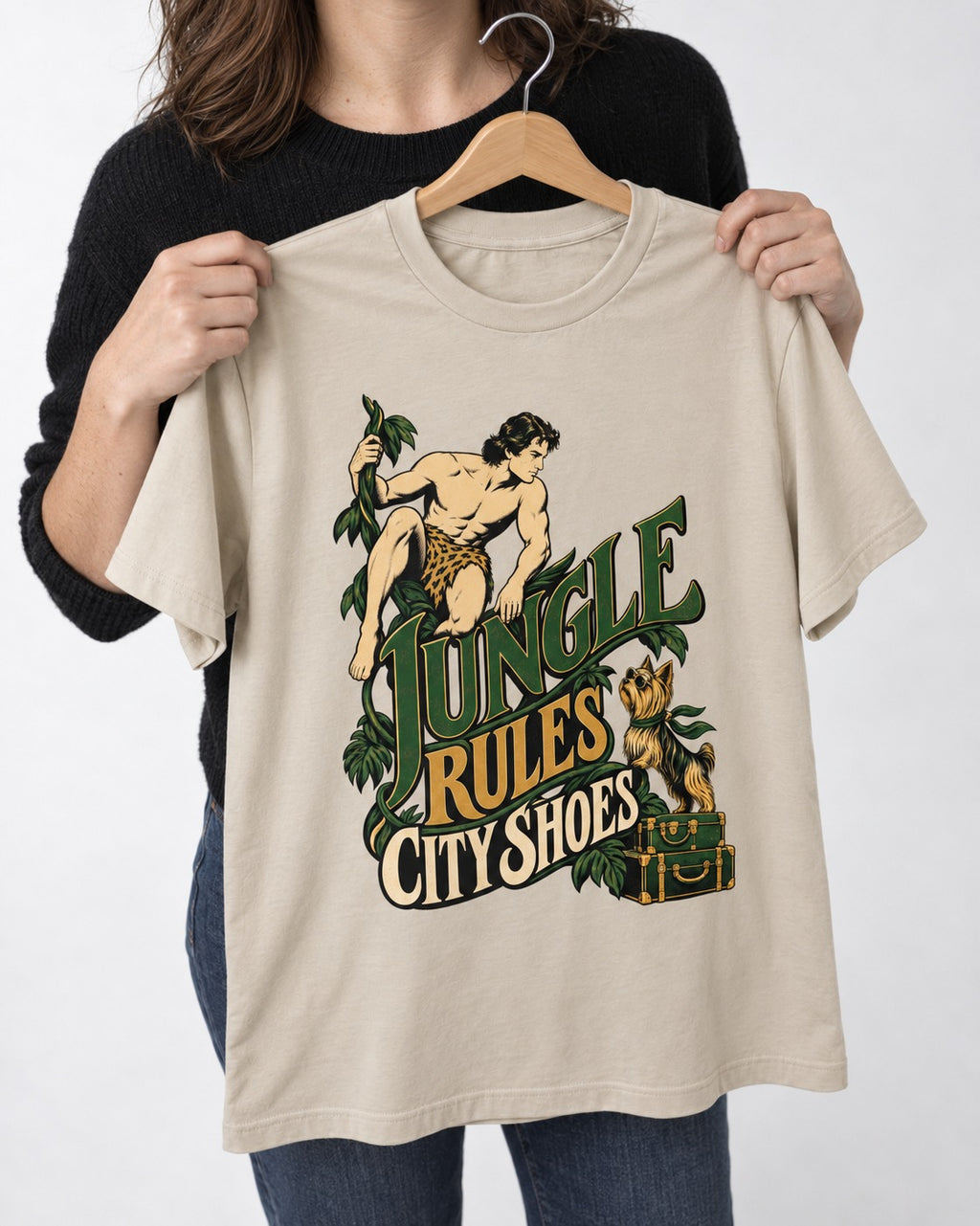 Jungle Rules City Shoes Yorkshire Terrier T-Shirt in Sand, held up on a hanger