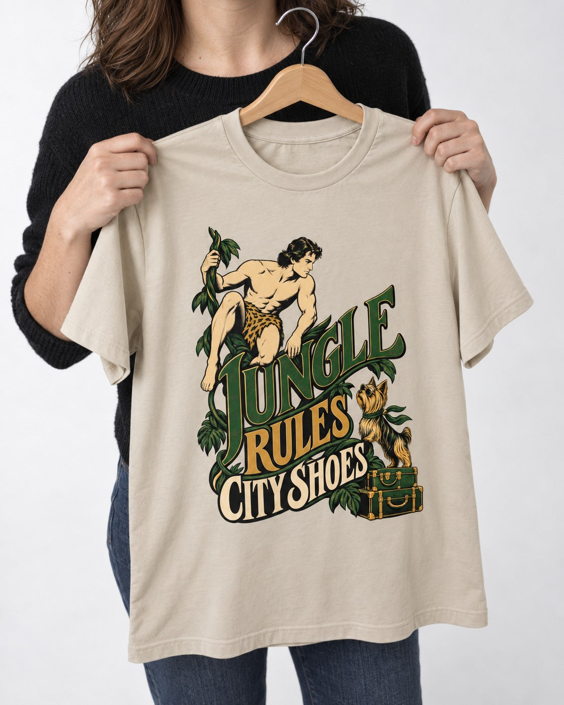 Jungle Rules City Shoes Yorkshire Terrier T-Shirt in Sand, held up on a hanger
