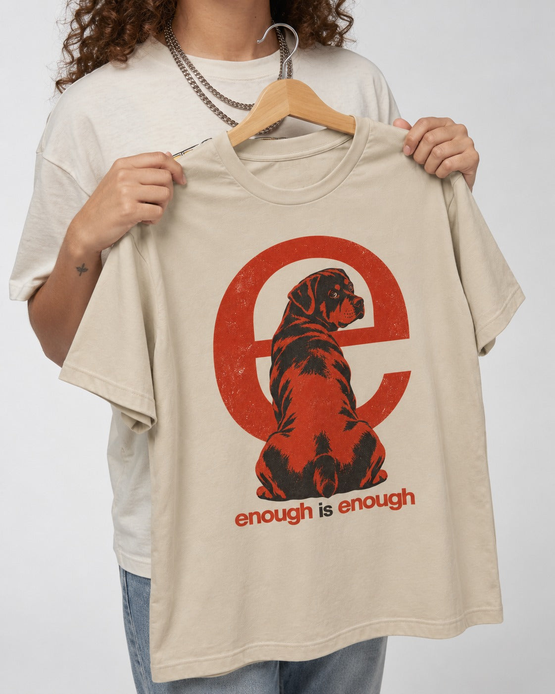 Rottweiler Enough Is Enough T-Shirt in Sand, held up on a hanger