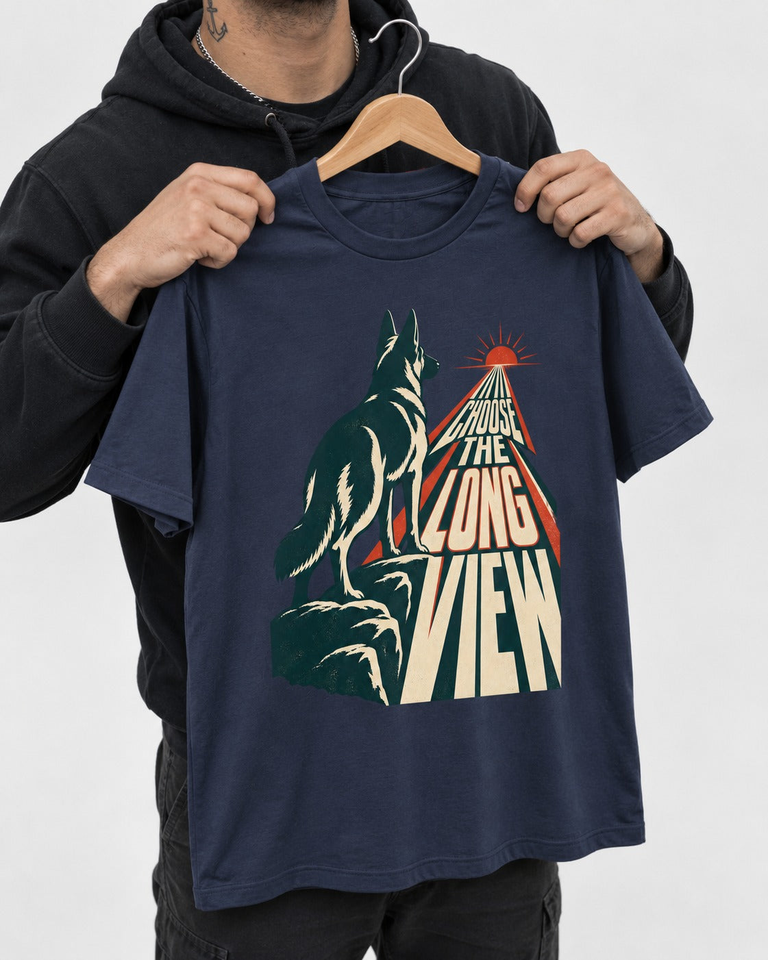 Choose the Long View Sunrise German Shepherd Dog Graphic T-Shirt in Navy, held up on a hanger