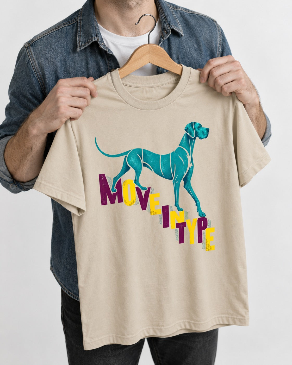 Great Dane Move in Type T-Shirt in Sand, held up on a hanger