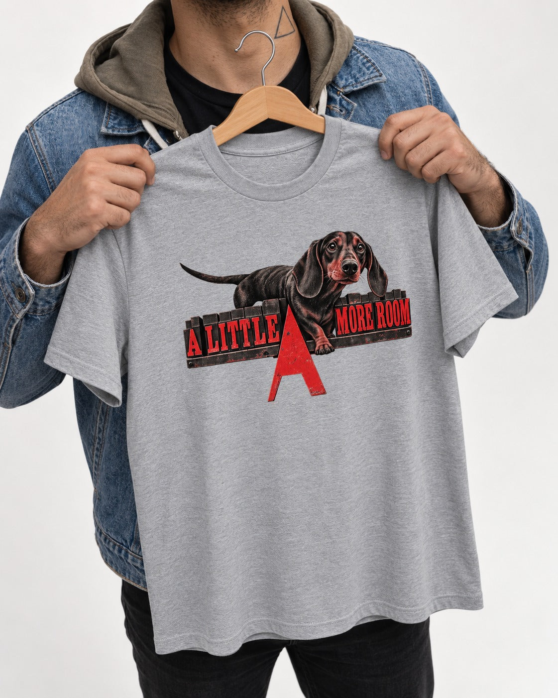More Room for Dachshund T-Shirt in Sport Grey, held up on a hanger