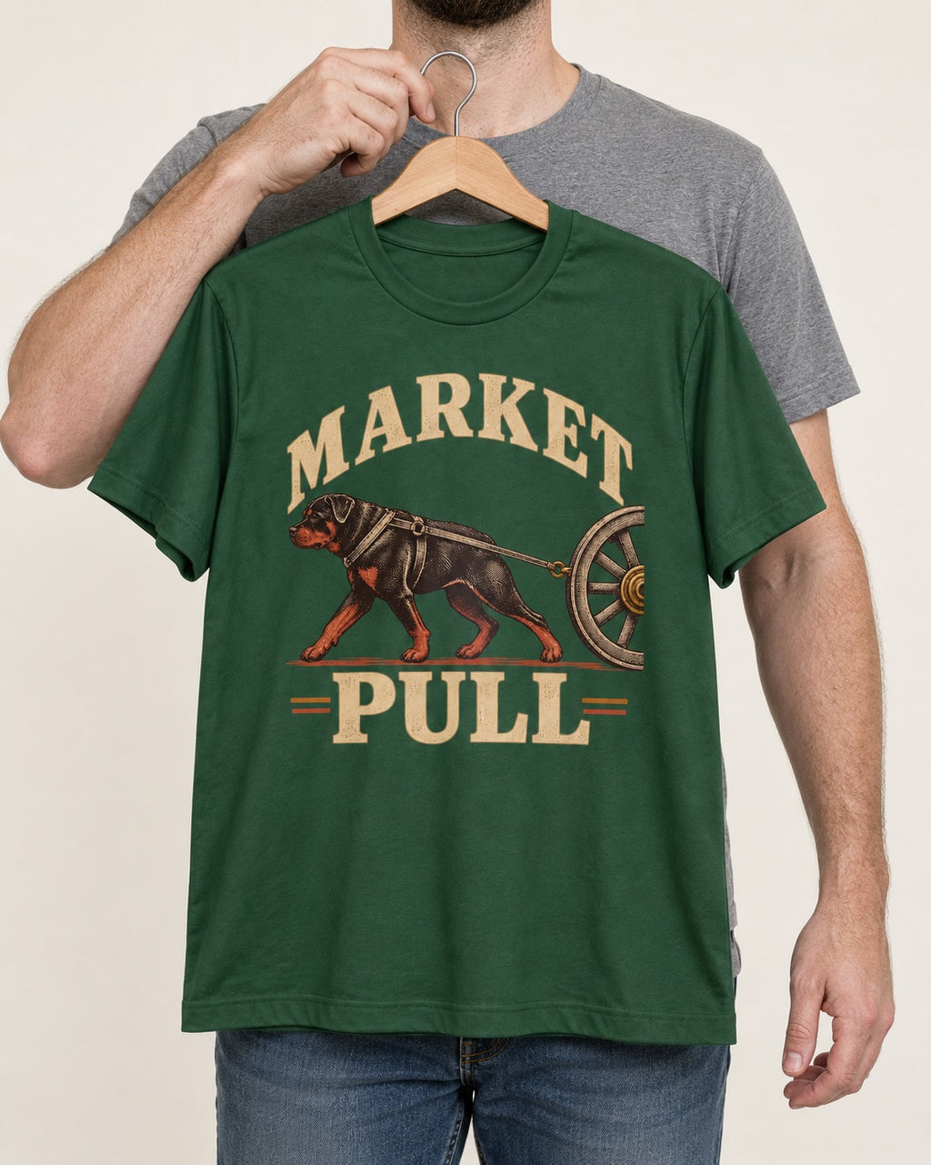 Market Pull Rottweiler Cart Harness Graphic T-Shirt in Forest Green, held up on a hanger