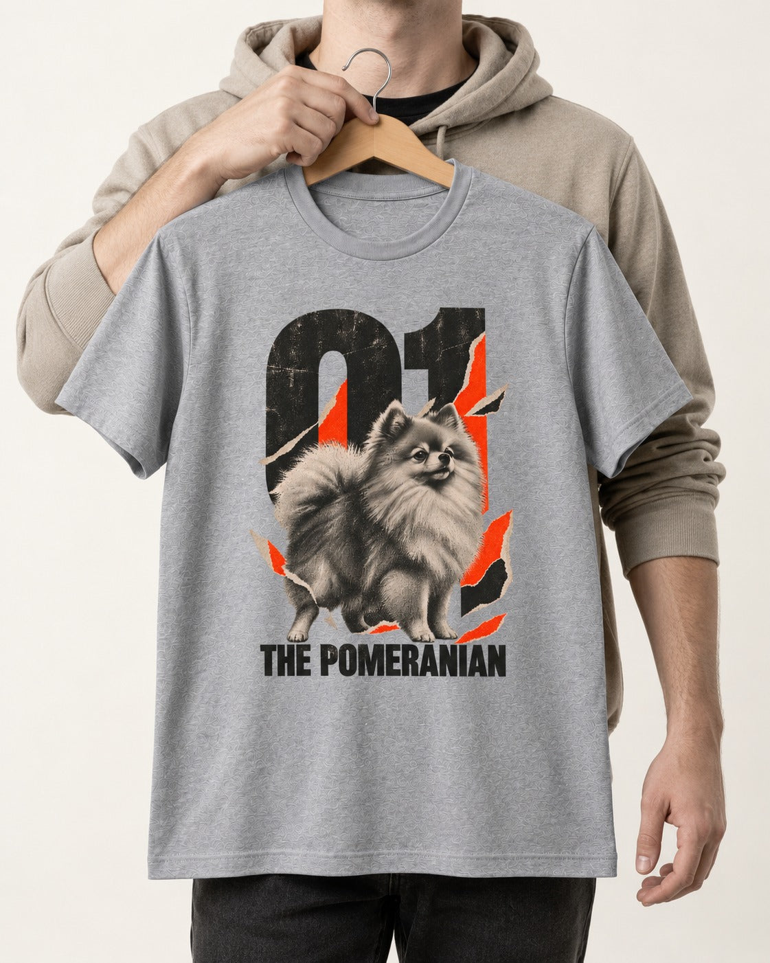 The Pomeranian T-Shirt in Sport Grey, held up on a hanger