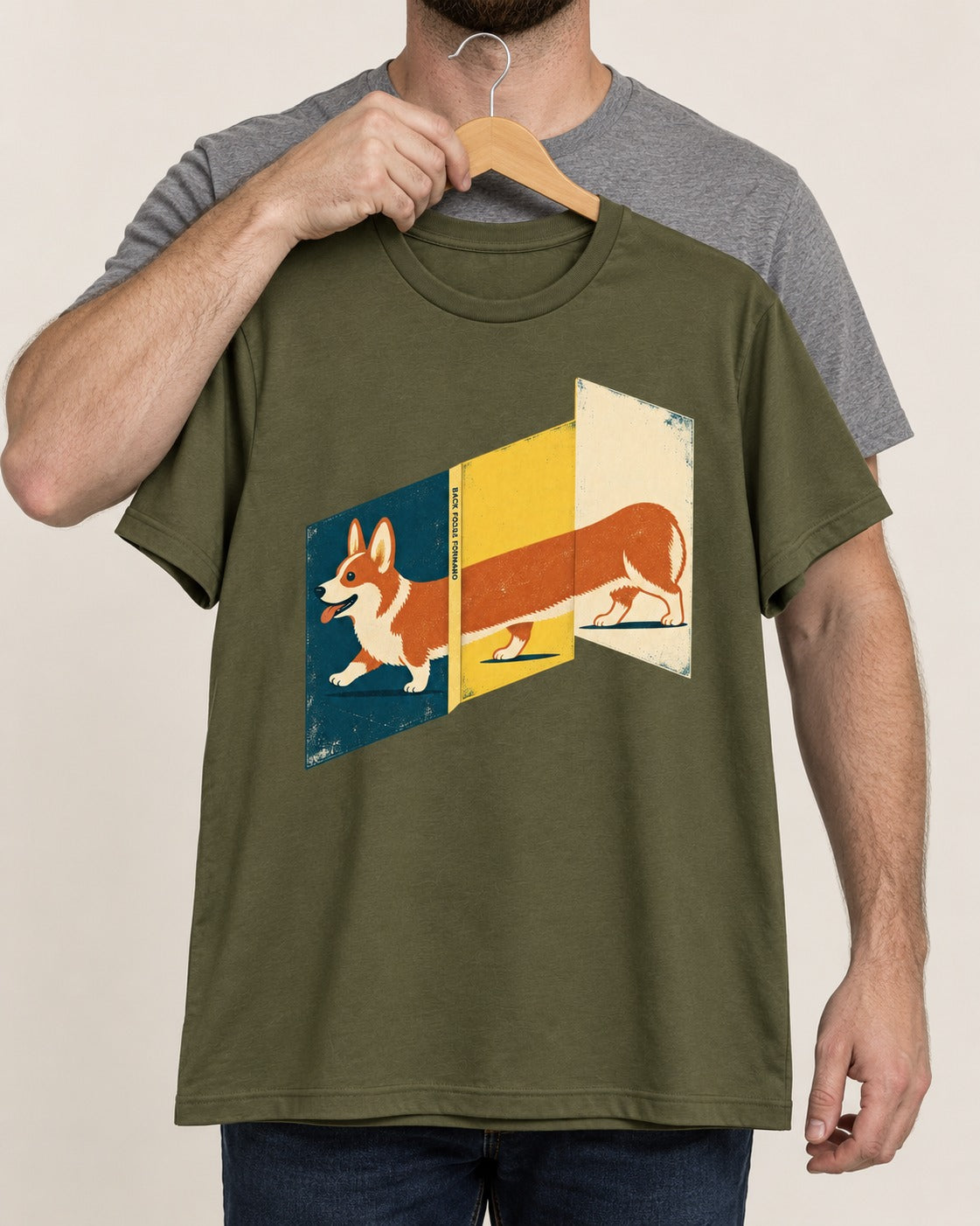 Corgi Back Folds Forward Panels T-Shirt in Heather Military Green, held up on a hanger
