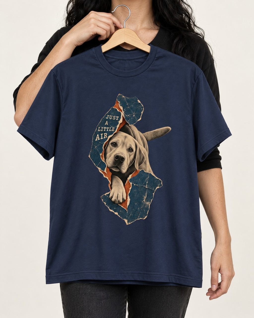 Labrador Retriever Just a Little Air Torn Paper Graphic T-Shirt in Navy, held up on a hanger