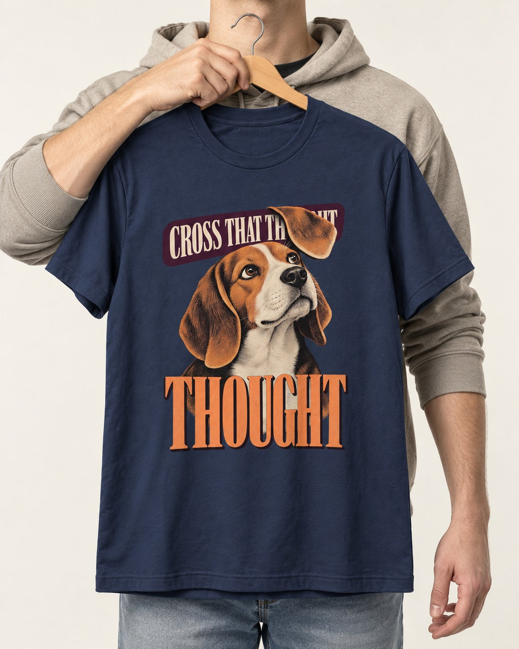Cross That Beagle Thought T-Shirt in Navy, held up on a hanger