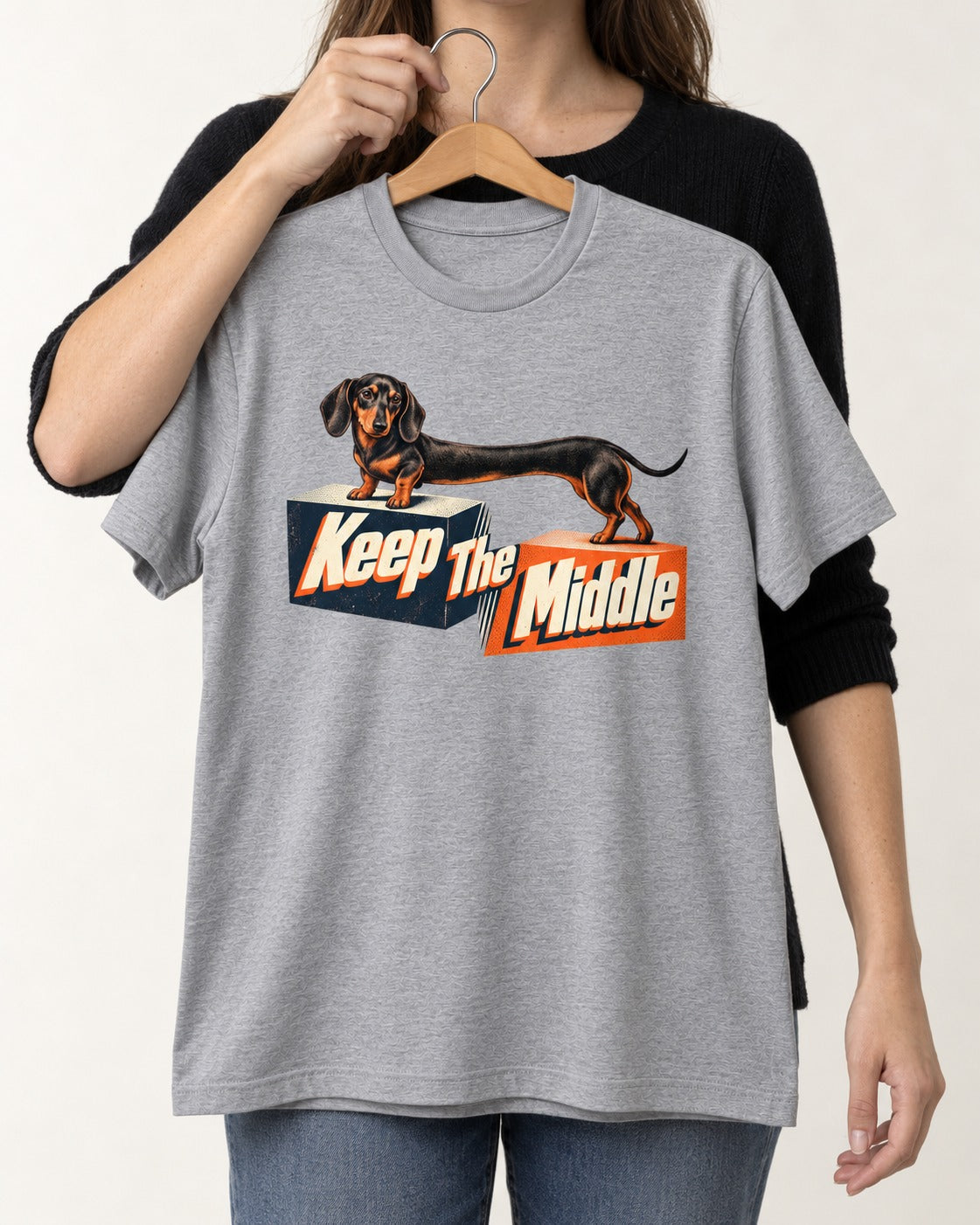 Dachshund Keep The Middle Block Bridge Graphic T-Shirt in Sport Grey, held up on a hanger