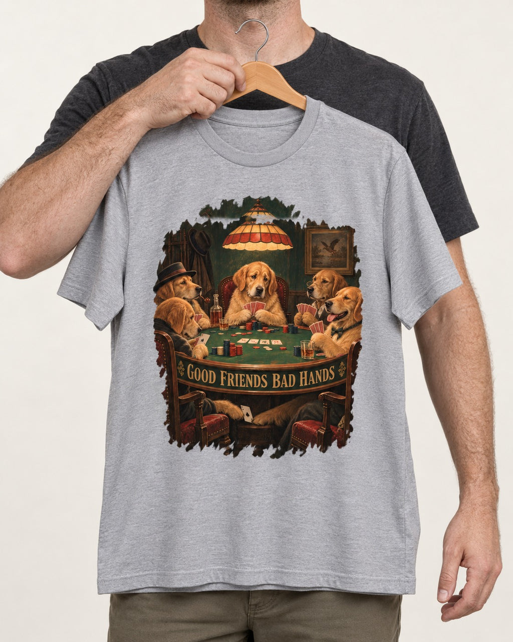 Good Friends Bad Hands Poker Golden Retriever Graphic T-Shirt in Sport Grey, held up on a hanger