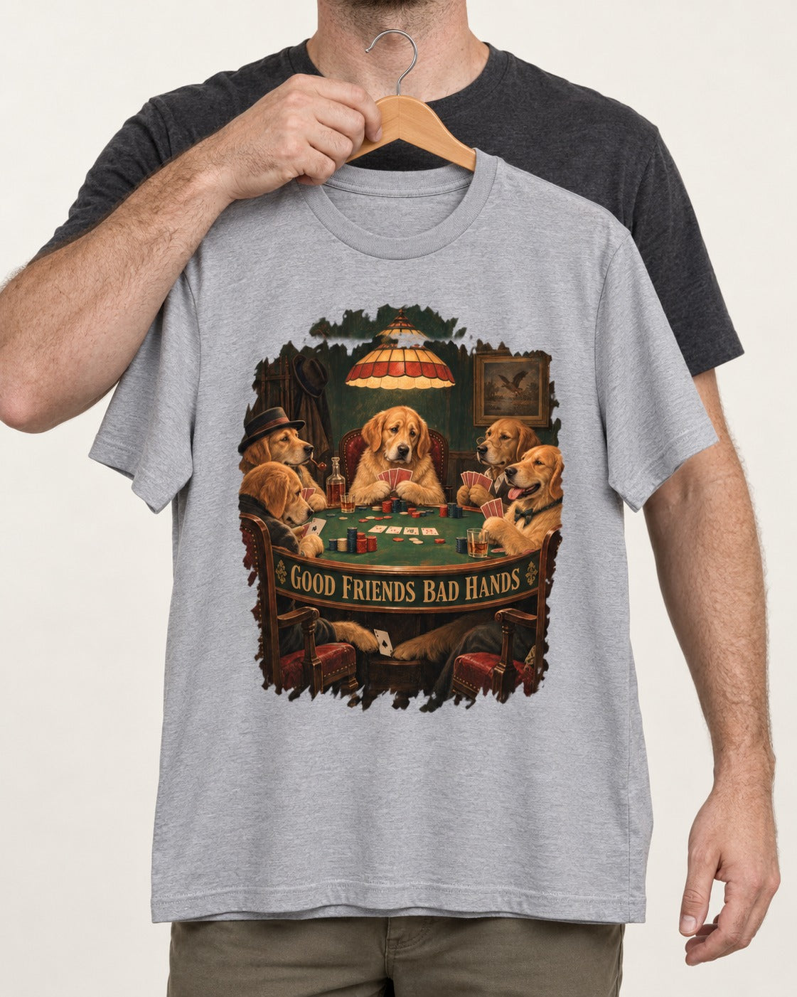 Good Friends Bad Hands Poker Golden Retriever Graphic T-Shirt in Sport Grey, held up on a hanger