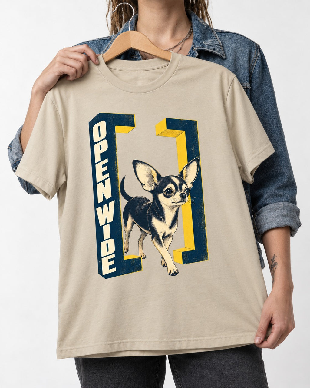 Open Wide Chihuahua T-Shirt in Sand, held up on a hanger