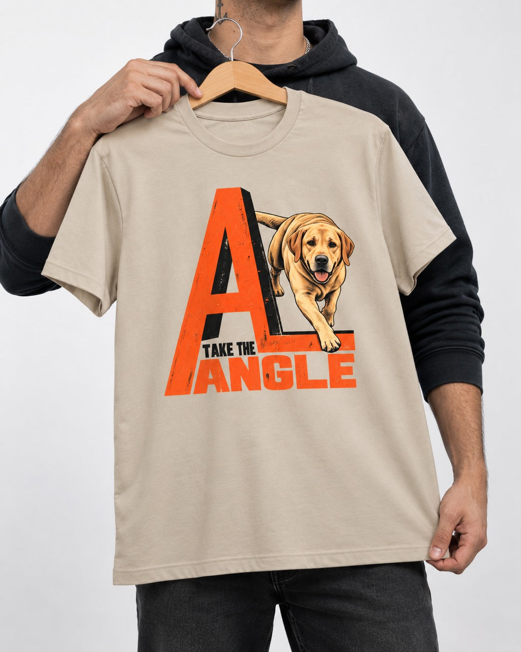 Take the Angle Labrador Retriever T-Shirt in Sand, held up on a hanger