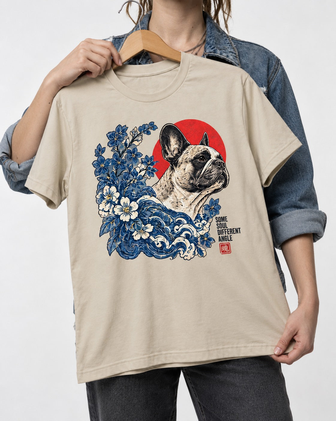 Some Soul Different Angle Frenchie T-Shirt in Sand, held up on a hanger