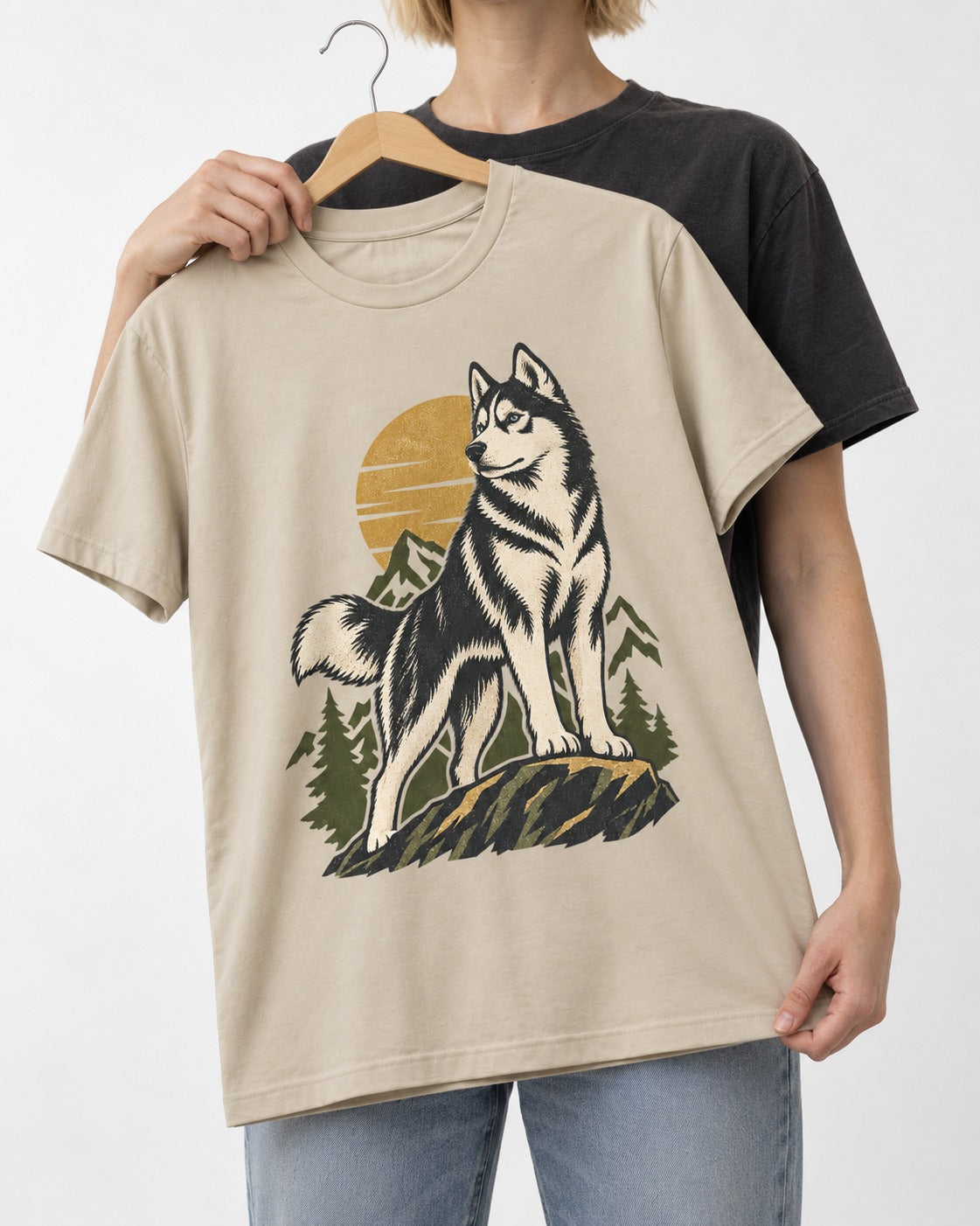 Husky Born to Roam T-Shirt in Sand, held up on a hanger