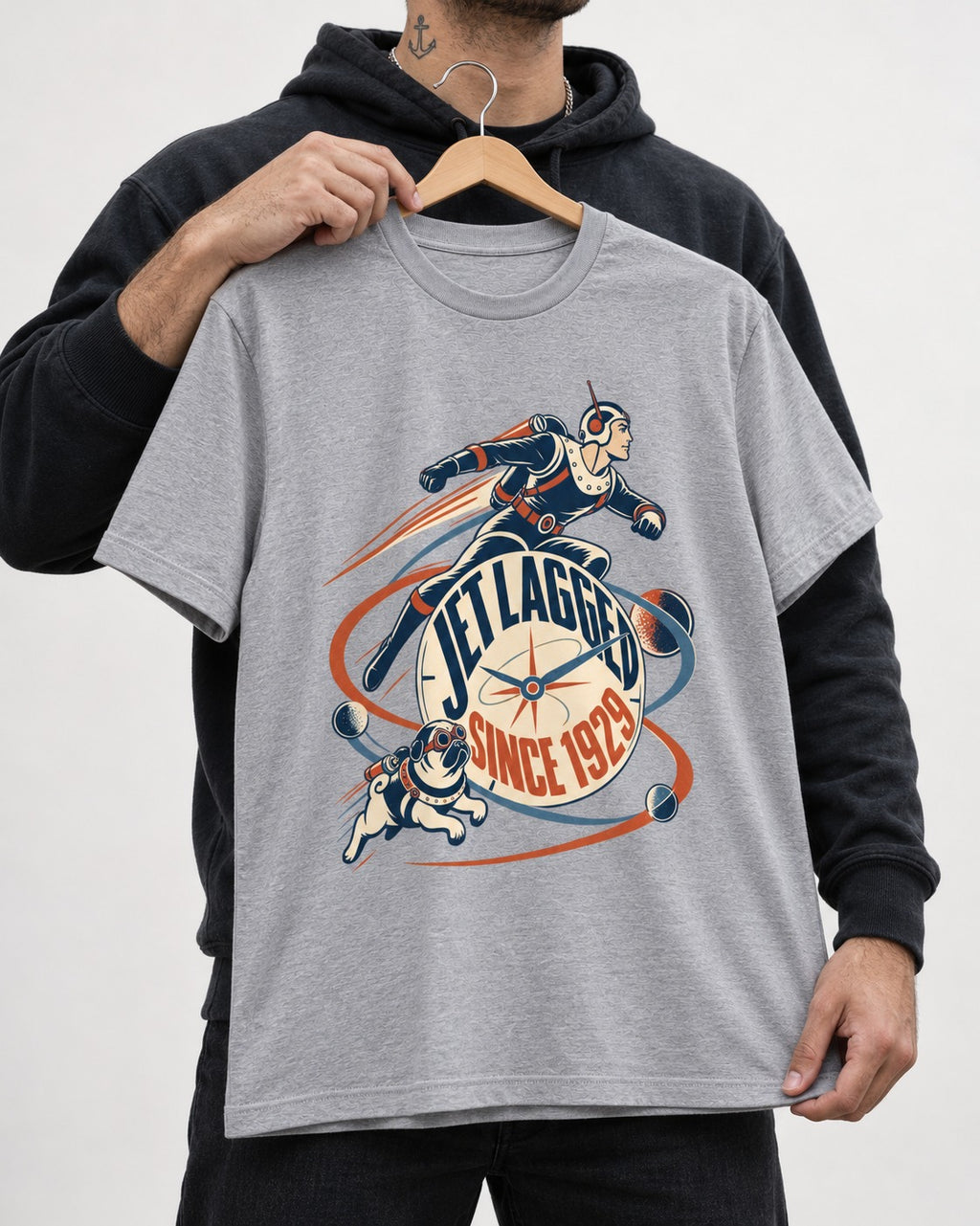 Jet Lagged Pug T-Shirt in Sport Grey, held up on a hanger