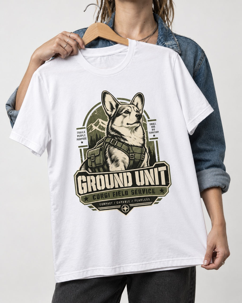 Corgi Ground Unit Field Service Badge T-Shirt in White, held up on a hanger