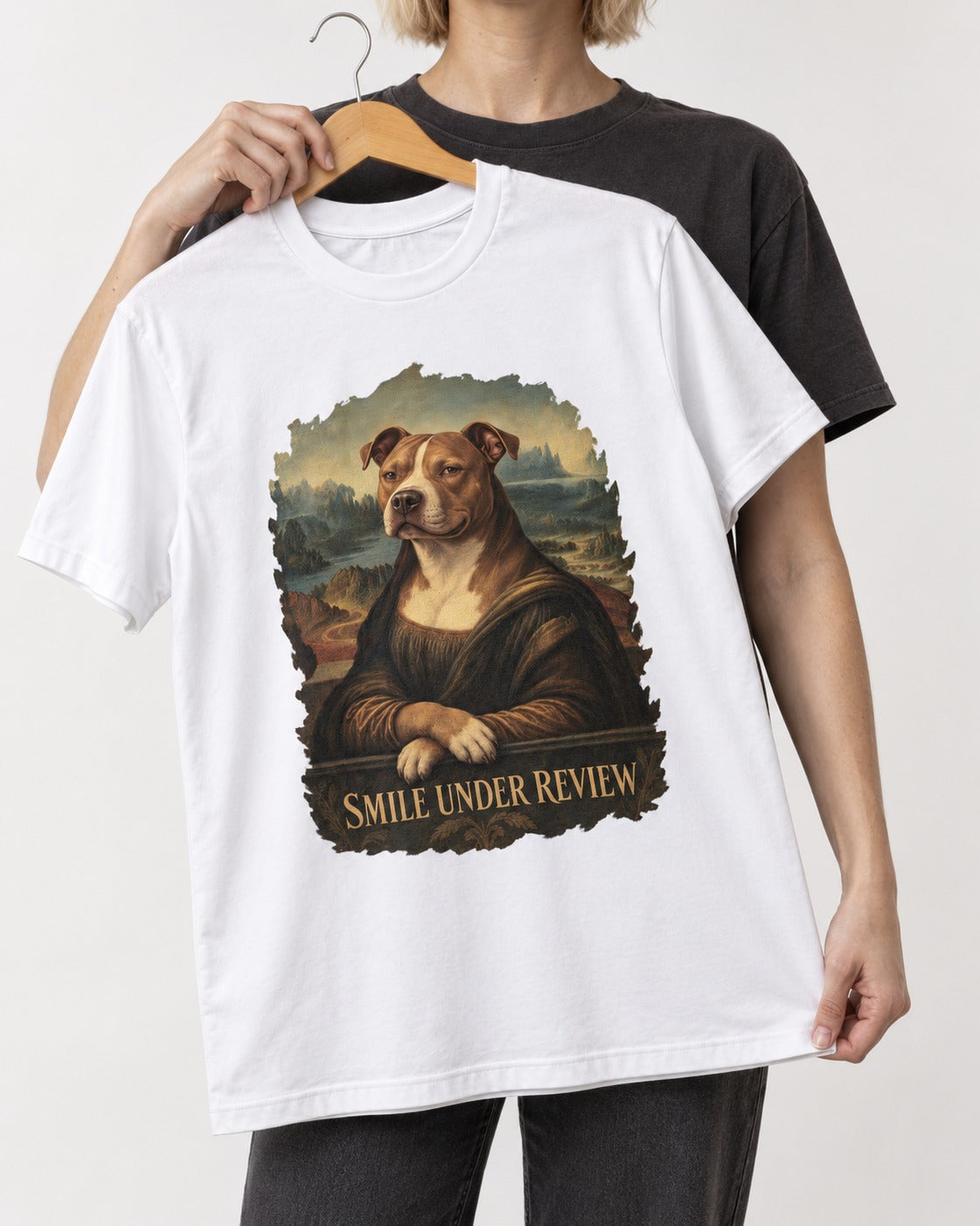 Pitbull Smile Under Review Renaissance Portrait Graphic T-Shirt in White, held up on a hanger