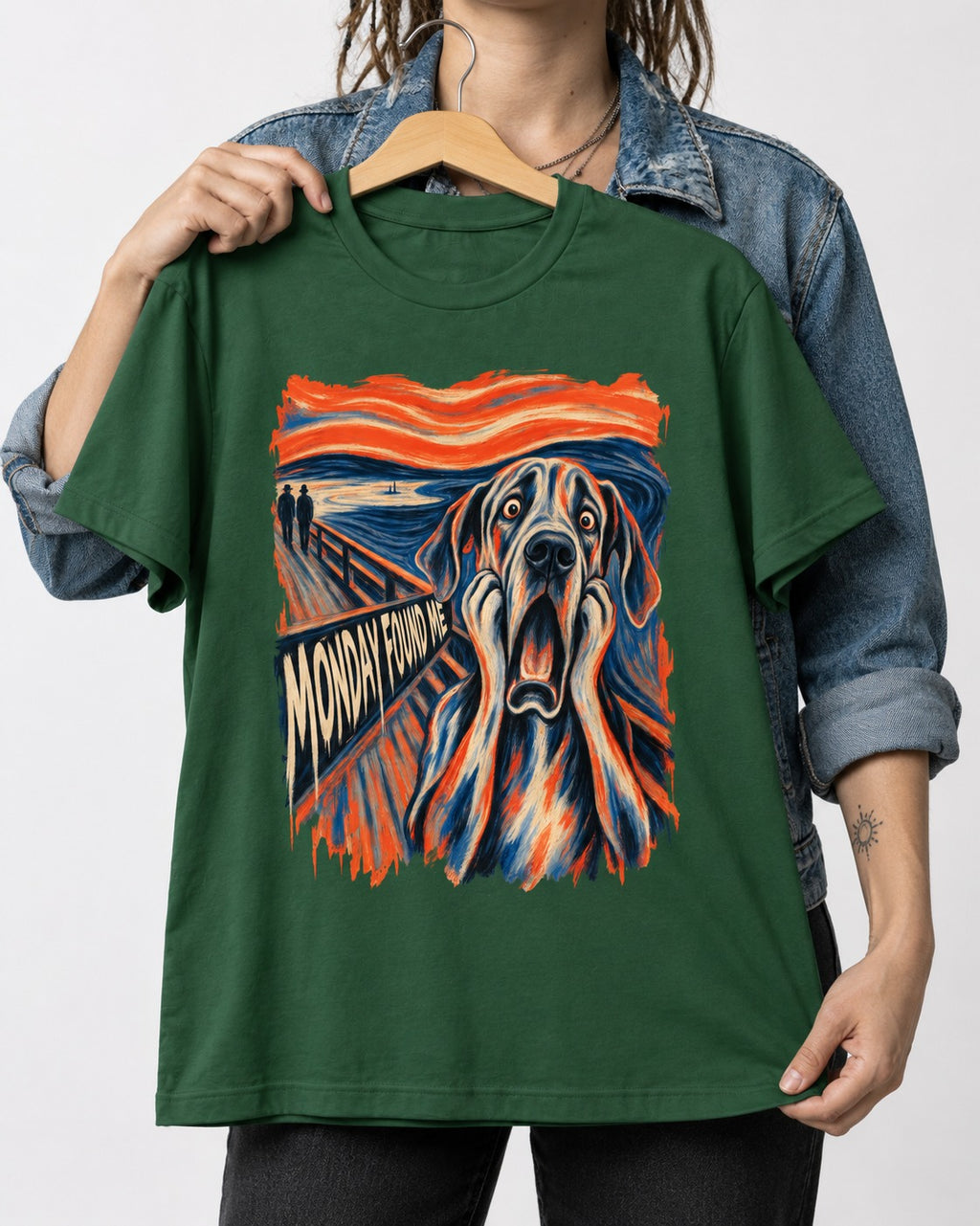 Great Dane Monday Found Me Scream Parody Graphic T-Shirt in Forest Green, held up on a hanger