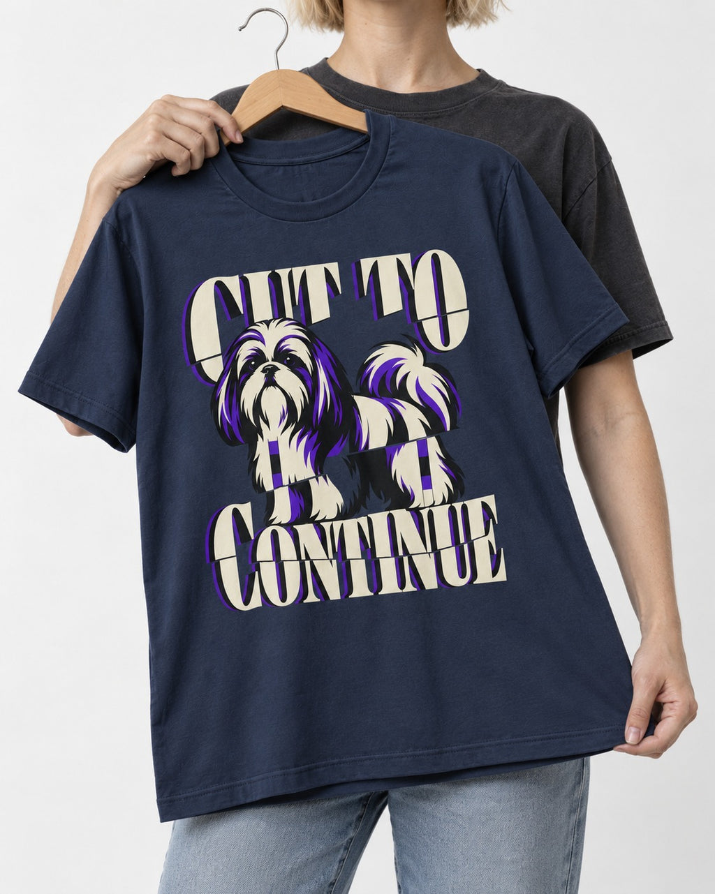 Shih Tzu Cut to Continue Dimensional Typography Graphic T-Shirt in Navy, held up on a hanger